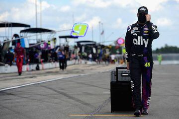 LONG POND, PENNSYLVANIA - JUNE 28: Jimmie Johnson, driver of the #48 Ally Chevrolet, walks on the grid prior to the NASCAR Cup Series Pocono 350 at Pocono Raceway on June 28, 2020 in Long Pond, Pennsylvania. Jared C. Tilton/Getty Images/AFP