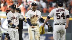 Houston Astros&#039; Josh Reddick (22), George Springer (4) and Roberto Osuna (54) celebrate after the Astros&#039; 7-2 win over the Cleveland Indians in Game 1 of a baseball American League Division Series, Friday, Oct. 5, 2018, in Houston. (AP Photo/Eri