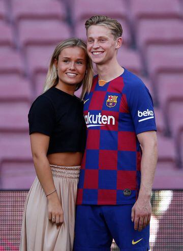 New Barcelona signing Frenkie de Jong and his girlfriend Mikky Kiemeney poses for a picture as he is unveiled at Camp Nou stadium on July 05.