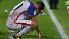 Christian Pulisic of the United States mens national team reacts to their loss to Trinidad and Tobago during the FIFA World Cup Qualifier match between Trinidad and Tobago at the Ato Boldon Stadium