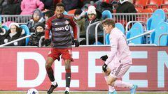 Mar 18, 2023; Toronto, Ontario, CAN; Toronto FC midfielder Mark-Anthony Kaye (14) battles for the ball with Inter Miami midfielder Robert Taylor (16) during the second half at BMO Field. Mandatory Credit: Nick Turchiaro-USA TODAY Sports