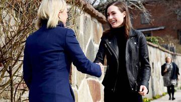 Swedish Prime Minister Magdalena Andersson welcomes Finnish Prime Minister Sanna Marin prior to a meeting on whether to seek NATO membership in Stockholm, Sweden, on April 13, 2022.