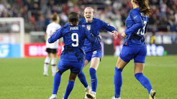Nov 13, 2022; Harrison, New Jersey, USA; United States forward Mallory Pugh (9) celebrates scoring a goal with midfielder Rose Lavelle (16) and forward Alex Morgan (13) during the second half against Germany at Red Bull Arena. Mandatory Credit: Vincent Carchietta-USA TODAY Sports