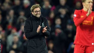 Liverpool&#039;s German manager Jurgen Klopp celebrates on the pitch