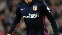Atletico Madrid's forward Fernando Torres celebrates after scoring a goal during the Spanish league football match Athletic Club vs Atletico de Madrid at the San Mames stadium in Bilbao on April 20, 2016