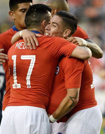 Chile defender Óscar Opazo, right, celebrates his goal with Gary Medel (17) during the first half of an international friendly soccer match against the United States, Tuesday, March 26, 2019, in Houston. (AP Photo/Eric Christian Smith)