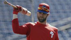 FILE - In this March 9, 2019 file photo Philadelphia Phillies&#039; Bryce Harper waits his turn in the batting cage before a spring training baseball game against the Toronto Blue Jays in Clearwater, Fla. For the first time since 2011, the Washington Nationals will go through a season without any help from Bryce Harper. So it&#039;s rather likely this year will be viewed, at least in part, as a referendum on whether the Nationals should have figured out a way to keep the young slugger. (AP Photo/Chris O&#039;Meara, file)