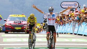PEYRAGUDES, FRANCE - JULY 20: Tadej Pogacar of Slovenia and UAE Team Emirates - White Best Young Rider Jersey celebrates at finish line as stage winner ahead of Jonas Vingegaard Rasmussen of Denmark and Team Jumbo - Visma - Yellow Leader Jersey during the 109th Tour de France 2022, Stage 17 a 129,7km stage from Saint-Gaudens to Peyragudes 1580m / #TDF2022 / #WorldTour / on July 20, 2022 in Peyragudes, France. (Photo by Tim de Waele/Getty Images)