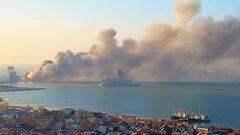 24 March 2022, Ukraine, Berdyansk: An image taken from a video shows smoke rising from the Russian navy landing ship Orsk at the Russian-occupied port of Berdyansk in southern Ukraine. The Ukrainian Navy reported it had sunk the Russian ship &quot;Orsk&qu