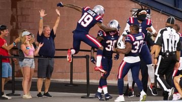 FOXBOROUGH, MA - AUGUST 12: Rhamondre Stevenson #38 celebrates with teammates Cam Newton #1, Damien Harris #37, and Isaiah Zuber #19 of the New England Patriots after scoring a touchdown against the Washington Football Team in the second half at Gillette 