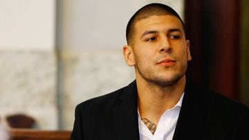 (FILES) This file photo taken on August 21, 2013 shows Aaron Hernandez sitting in the courtroom of the Attleboro District Court during his hearing in North Attleboro, Massachusetts. Former American football star Aaron Hernandez on April 19, 2017 was foun