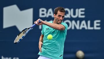MONTREAL, QUEBEC - AUGUST 11: Albert Ramos-Vinolas of Spain hits a return against Hubert Hurkacz of Poland during Day 6 of the National Bank Open at Stade IGA on August 11, 2022 in Montreal, Canada.   Minas Panagiotakis/Getty Images/AFP
== FOR NEWSPAPERS, INTERNET, TELCOS & TELEVISION USE ONLY ==