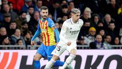 MADRID, SPAIN - FEBRUARY 2: (L-R) Jose Gaya of Valencia, Fede Valverde of Real Madrid  during the La Liga Santander  match between Real Madrid v Valencia at the Estadio Santiago Bernabeu on February 2, 2023 in Madrid Spain (Photo by David S. Bustamante/Soccrates/Getty Images)