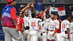 Panama's Johnny Yussef Santos celebrates with teammates after scoring during the Caribbean Series baseball game between Panama and Puerto Rico at LoanDepot Park in Miami, Florida, on February 5, 2024. (Photo by Chandan Khanna / AFP)