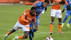 Feb 16, 2022; Hamilton, Ontario, Canada; Forge FC defender Aboubakar Sissoko (33) challenges for the ball with Cruz Azul forward Chirstian Tabo (11) in the first half of a CONCACAF Champions League game at Tim Hortons Field. Mandatory Credit: Dan Hamilton