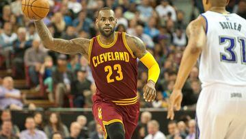Cavaliers forward LeBron James dribbles the ball up the court against the Sacramento Kings at Sleep Train Arena.