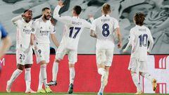 MADRID, SPAIN - MARCH 16: Karim Benzema of Real Madrid Celebrates 1-0 with Vinicius Junior of Real Madrid, Lucas Vazquez of Real Madrid, Toni Kroos of Real Madrid, Luka Modric of Real Madrid  during the UEFA Champions League  match between Real Madrid v A