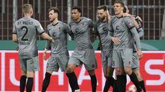 St. Pauli players celebrate their side&#039;s second goal during the German Soccer Cup round of 16 soccer match between FC St. Pauli and Borussia Dortmund in Hamburg, Germany, Tuesday, Jan. 18, 2022. Dortmund&#039;s Axel Witsel scored an own goal. (AP Pho