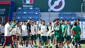 Mexico's players joke with Mexico's forward Alexis Vega (C)  during  a training session at Al Khor SC in Al Khor, north of Doha, on November 25, 2022, on the eve of the Qatar 2022 World Cup football match between Argentina and Mexico. (Photo by Alfredo ESTRELLA / AFP)