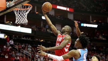 Feb 14, 2018; Houston, TX, USA; Houston Rockets forward Luc Mbah a Moute (12) shoots the ball against the Sacramento Kings during the first quarter at Toyota Center. Mandatory Credit: Erik Williams-USA TODAY Sports