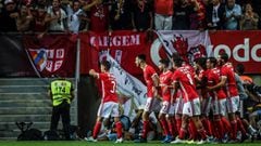 Benfica&#039;s Spanish defender Grimaldo Garcia (L) celebrates a goal with teammates during the Portugal&#039;s Super Cup final football match between SL Benfica and Sporting CP at the Algarve stadium in Faro on August 4, 2019. (Photo by PATRICIA DE MELO 