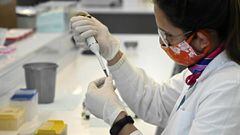 A scientist works at the mAbxience biosimilar monoclonal antibody laboratory plant in Garin, Buenos Aires province, on August 14, 2020, where an experimental coronavirus vaccine will be produced for Latin America. - Argentina will manufacture while Mexico