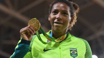 Rafaela Silva of Brazil celebrates after winning the gold medal in the Women's -57 kg Final - Gold Medal Contest on Day 3 of the Rio 2016 Olympic Games at Carioca Arena 2 on August 8, 2016 in Rio de Janeiro, Brazil.