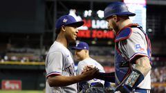 PHOENIX, ARIZONA - OCTOBER 31: Jos� Leclerc #25 and Jonah Heim #28 of the Texas Rangers celebrate after beating the Arizona Diamondbacks 11-7 in Game Four of the World Series at Chase Field on October 31, 2023 in Phoenix, Arizona.   Christian Petersen/Getty Images/AFP (Photo by Christian Petersen / GETTY IMAGES NORTH AMERICA / Getty Images via AFP)