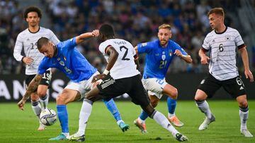 Italy's forward Gianluca Scamacca (L) challenges Germany's defender Antonio Ruediger during the UEFA Nations League - League A, Group 3 first leg football match between Italy and Germany on June 4, 2022 at the Renato Dall'Ara stadium in Bologna. (Photo by MIGUEL MEDINA / AFP) (Photo by MIGUEL MEDINA/AFP via Getty Images)
