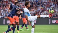 Montpellier&#039;s French midfielder Junior Sambia (L) fights for the ball with Marseille&#039;s Spanish-US forward Konrad de la Fuente (R) during the French L1 football match between Montpellier and Marseille at the Mosson stadium in Montpellier, souther