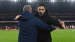 LONDON, ENGLAND - JANUARY 22: (L) Arsenal manager Mikel Arteta celebrates with (R) 1st team coach Steve Round after the Premier League match between Arsenal FC and Manchester United at Emirates Stadium on January 22, 2023 in London, England. (Photo by Stuart MacFarlane/Arsenal FC via Getty Images)