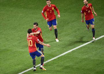 Spain's forward Nolito (2nd L) celebrates with Spain's midfielder Cesc Fabregas (L), Spain's forward Alvaro Morata (2nd R) and Spain's defender Juanfran (R) after scoring the 2-0 during the Euro 2016 group D football match between Spain and Turkey