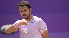 Switzerland's Stanislas Wawrinka reacts as he plays against Tommy Paul of the US during their men's single tennis match round of 8 on Day 4 of the ATP Championships tournament at Queen's Club in west London, on June 16, 2022. (Photo by Daniel LEAL / AFP) (Photo by DANIEL LEAL/AFP via Getty Images)