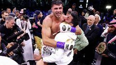 RIYADH, SAUDI ARABIA - FEBRUARY 26: Tommy Fury celebrates with their team after defeating Jake Paul during the Cruiserweight Title fight between Jake Paul and Tommy Fury at the Diriyah Arena on February 26, 2023 in Riyadh, Saudi Arabia. (Photo by Francois Nel/Getty Images)