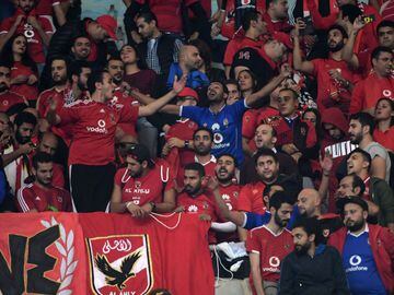 Al-Ahly's fans cheer for their team prior to the CAF Champions League second leg final football match between Egypt's Al-Ahly and Tunisia's ES Tunis.
