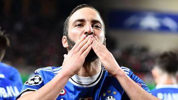 Juventus forward from Argentina Gonzalo Higuain reacts after scoring a goal during the UEFA Champions League semi-final first leg football match Monaco vs Juventus at the Stade Louis II stadium in Monaco on May 3, 2017.  / AFP PHOTO / FRANCK FIFE