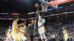 Mar 6, 2018; Oakland, CA, USA; Golden State Warriors forward Draymond Green (23) blocks a shot by Brooklyn Nets guard D&#039;Angelo Russell (1) in the fourth quarter at Oracle Arena. Mandatory Credit: John Hefti-USA TODAY Sports