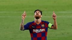 Lionel Messi celebrates victory over Napoli in the Champions League last 16.
