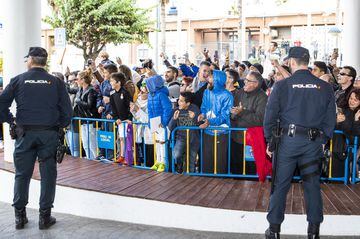 Real Madrid fans wait for the team to arrive in Melilla.