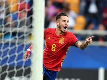 Saúl celebrates his spectacular opening goal for Spain on Saturday night.
