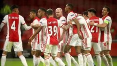 AMSTERDAM, NETHERLANDS - MARCH 11: Davy Klaassen of Ajax  celebrates with Antony and teammates after scoring their team&#039;s first goal during the UEFA Europa League Round of 16 First Leg match between Ajax and BSC Young Boys at Johan Cruijff Arena on M
