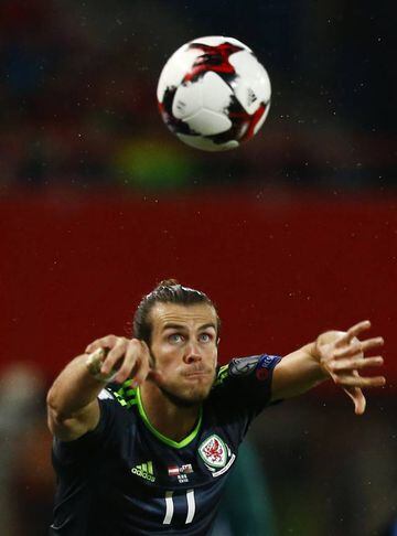 Wales' Gareth Bale takes a throw in