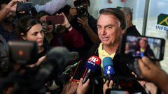 FILE PHOTO: Brazil's former President Jair Bolsonaro speaks with media as he arrives at the airport in Rio de Janeiro, on the day the Electoral Justice continues the trial to determine his political rights, Brazil June 29, 2023. REUTERS/Pilar Olivares/File Photo