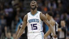 File-This March 26, 2019, file photo shows Charlotte Hornets&#039; Kemba Walker (15) reacting after making a basket against the San Antonio Spurs during the second half of an NBA basketball game in Charlotte, N.C. A person with knowledge of the situation says Kemba Walker has told the Charlotte Hornets of his intention to sign with the Boston Celtics once the NBA&#039;s offseason moratorium ends July 6. Walker is planning to meet with the Celtics on Sunday, June 30, 2019, to discuss and likely finalize a four-year, $141 million deal, according to the person who spoke to The Associated Press on condition of anonymity because neither Walker nor the Hornets publicly revealed any details. (AP Photo/Chuck Burton, File)