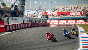 ASSEN, NETHERLANDS - JUNE 25: Francesco Bagnaia of Italy and Ducati Lenovo Team rides in front of Alex Rins of Spain and Team SUZUKI ECSTAR and Luca Marini of Italy and Mooney VR46 Racing Team David during the qualifying session of the MotoGP Motul TT Assen at TT Circuit Assen on June 25, 2022 in Assen, Netherlands. (Photo by Steve Wobser/Getty Images)