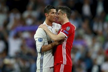 Cristiano Ronaldo and Lewandowski greet each other in one of their many confrontations.