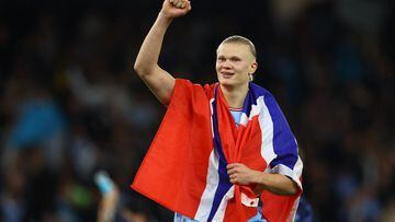 Soccer Football - Champions League - Semi Final - Second Leg - Manchester City v Real Madrid - Etihad Stadium, Manchester, Britain - May 17, 2023 Manchester City's Erling Braut Haaland celebrates with a Norway flag after the match REUTERS/Molly Darlington