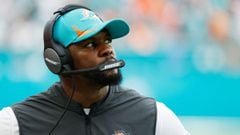 (FILES) In this file photo taken on December 19, 2021, head coach of the Miami Dolphins Brian Flores looks on from the side line during the game against the New York Jets at Hard Rock Stadium in Miami Gardens, Florida. - Flores, who has filed a lawsuit ag