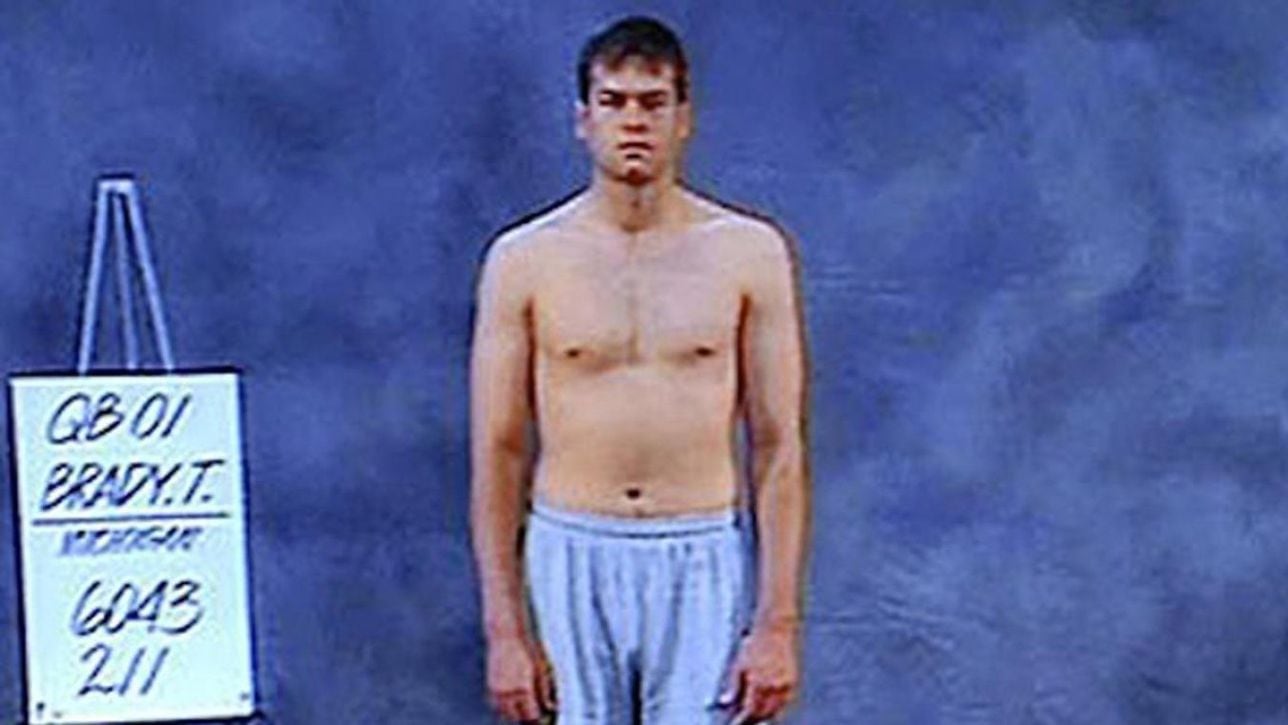 What draft position was Tom Brady selected and what college did he play