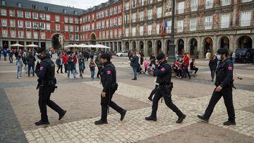Police intervene to prevent clashes between Chelsea and Manchester City fans in the centre of Madrid